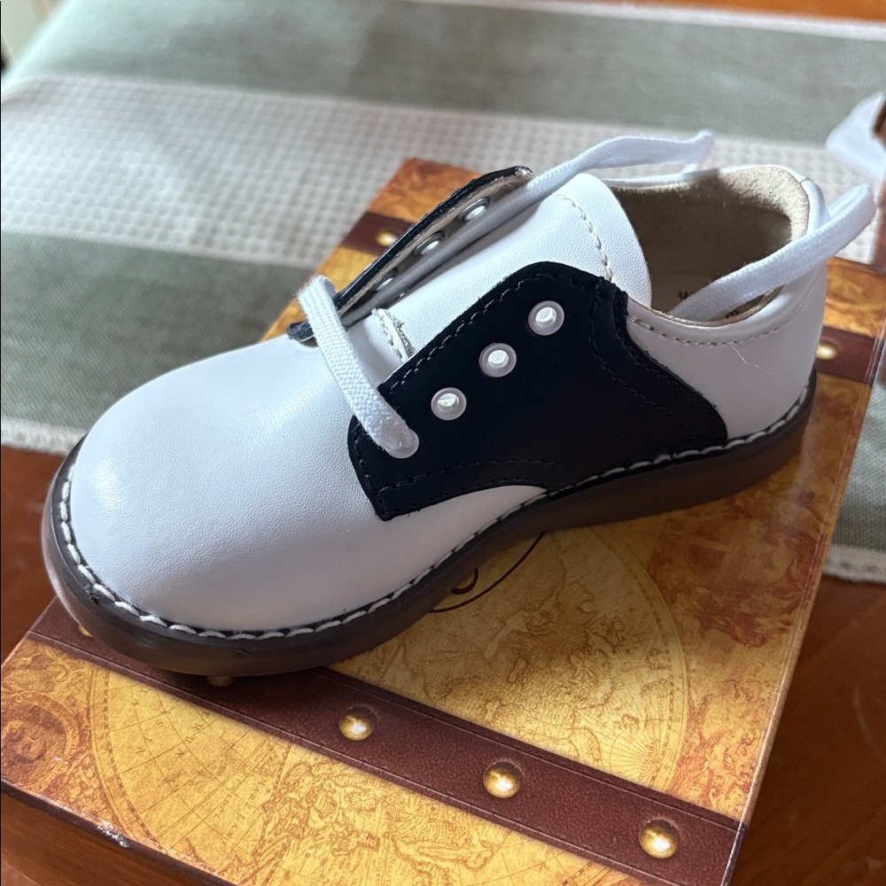 Footmates navy and white toddler saddles!